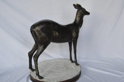 Doe - baby deer bronze statue -  Size: 30"L x 8"W x 30"H.