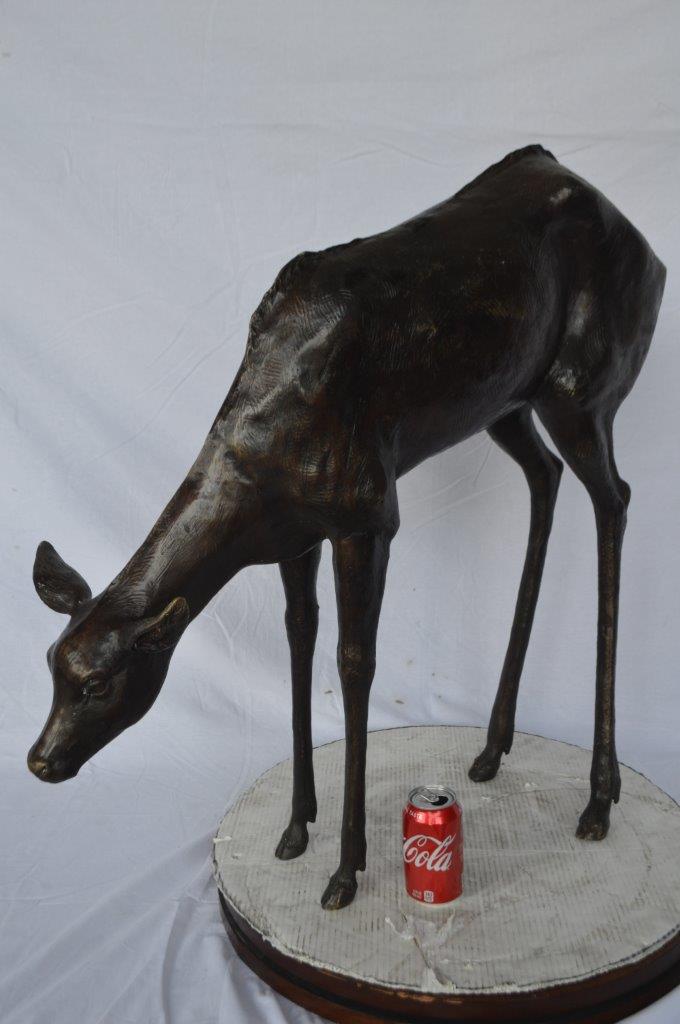 Life Size deer bronze statue -  Size: 33"L x 9"W x 34"H.