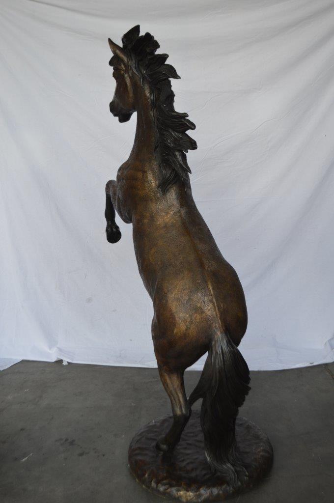 Beautiful stallion horse bronze statue -  Size: 47"L x 28"W x 74"H.