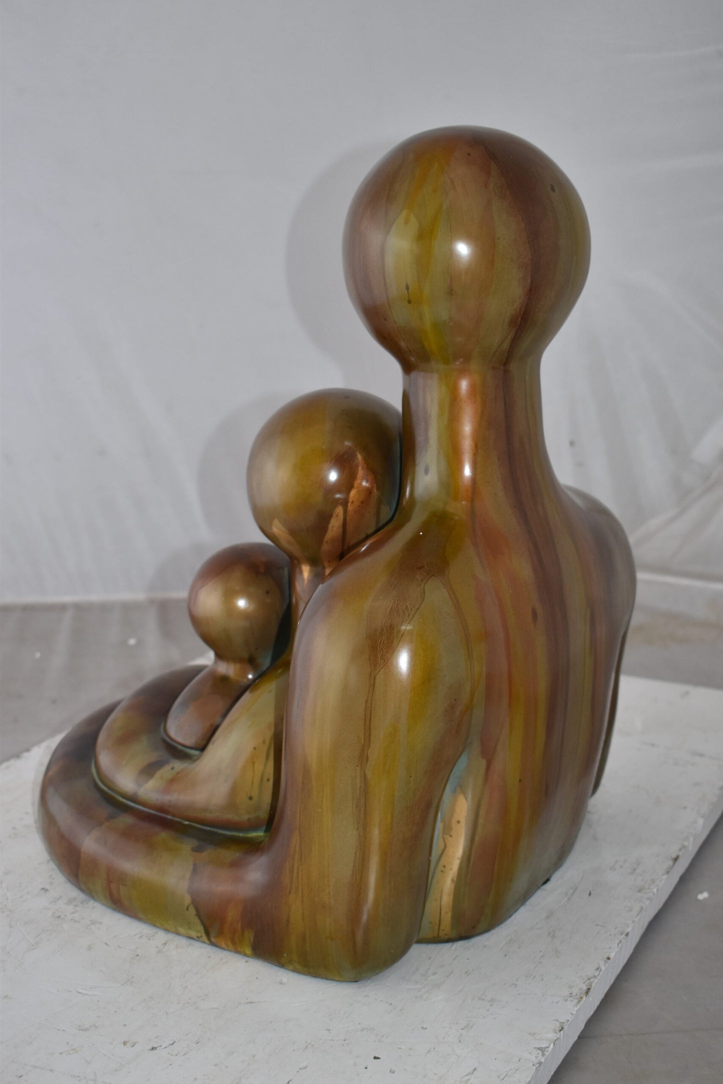 Contemporary Familial Embrace Resin Statue Size: 13" x 14" x 19"H