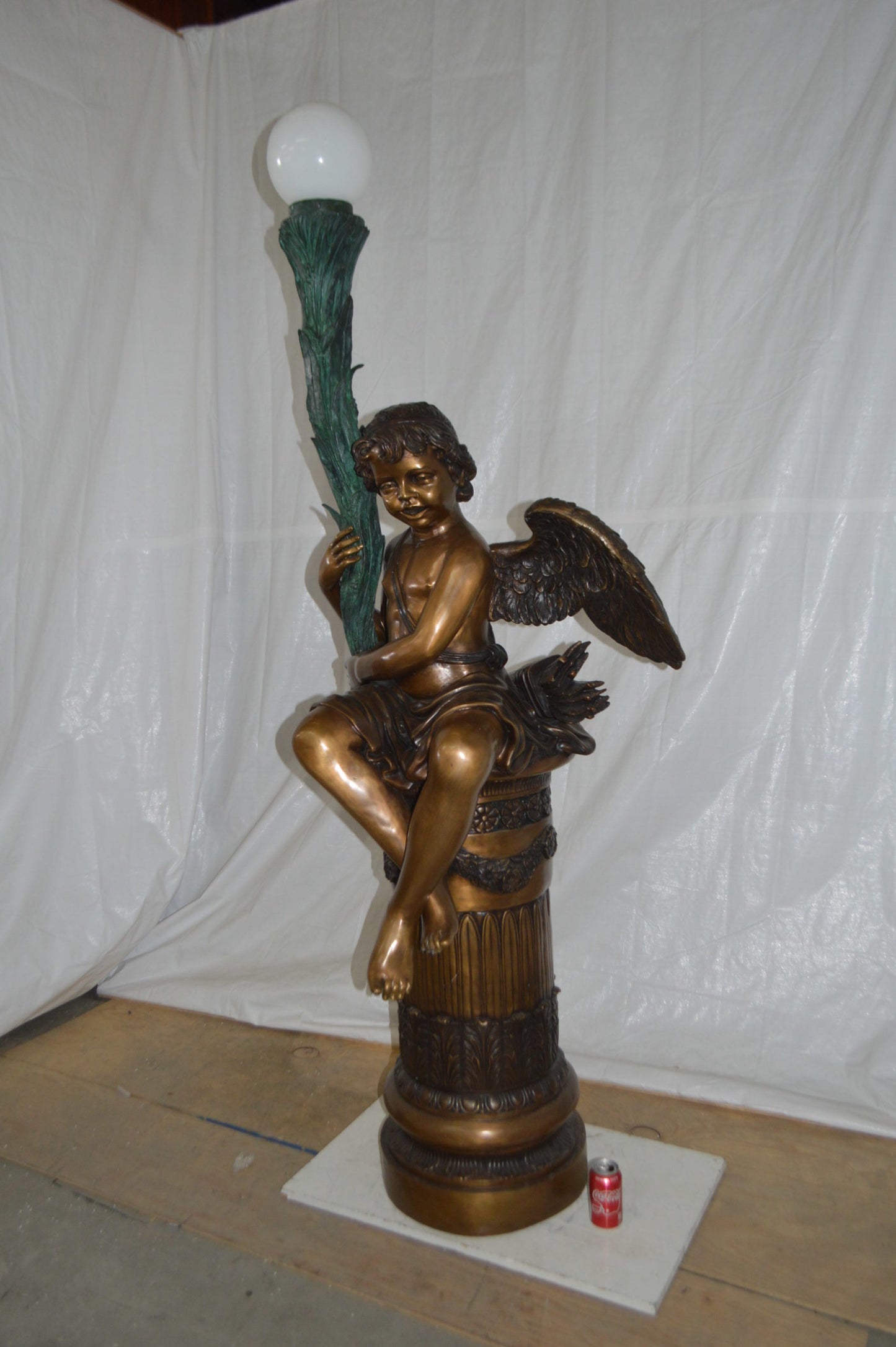 Pair of Cupid on stand lamp -  Size: 28"L x 24"W x 90"H.