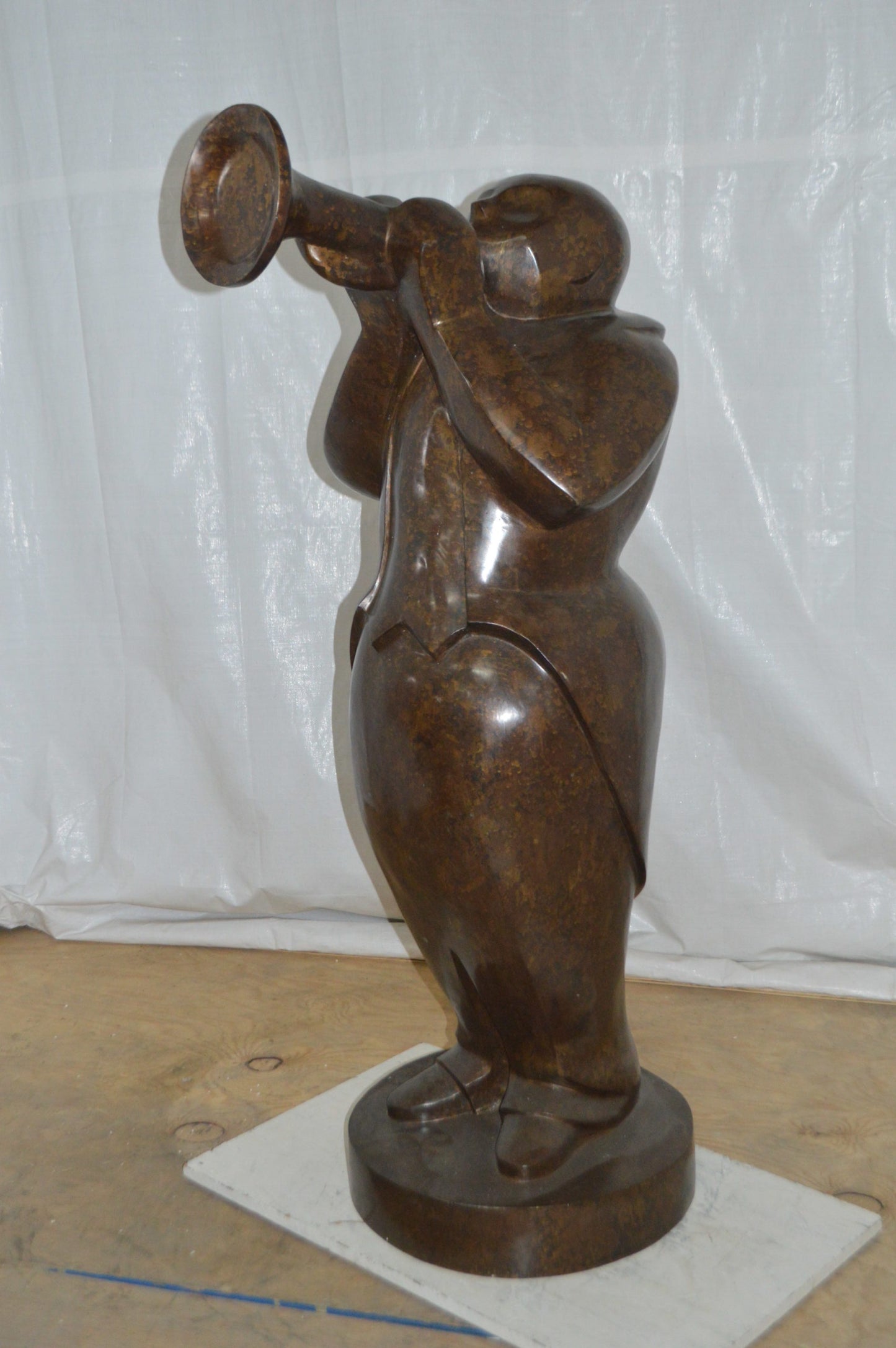 Musician playing the trumpet bronze statue -  Size: 24"L x 20"W x 56"H.