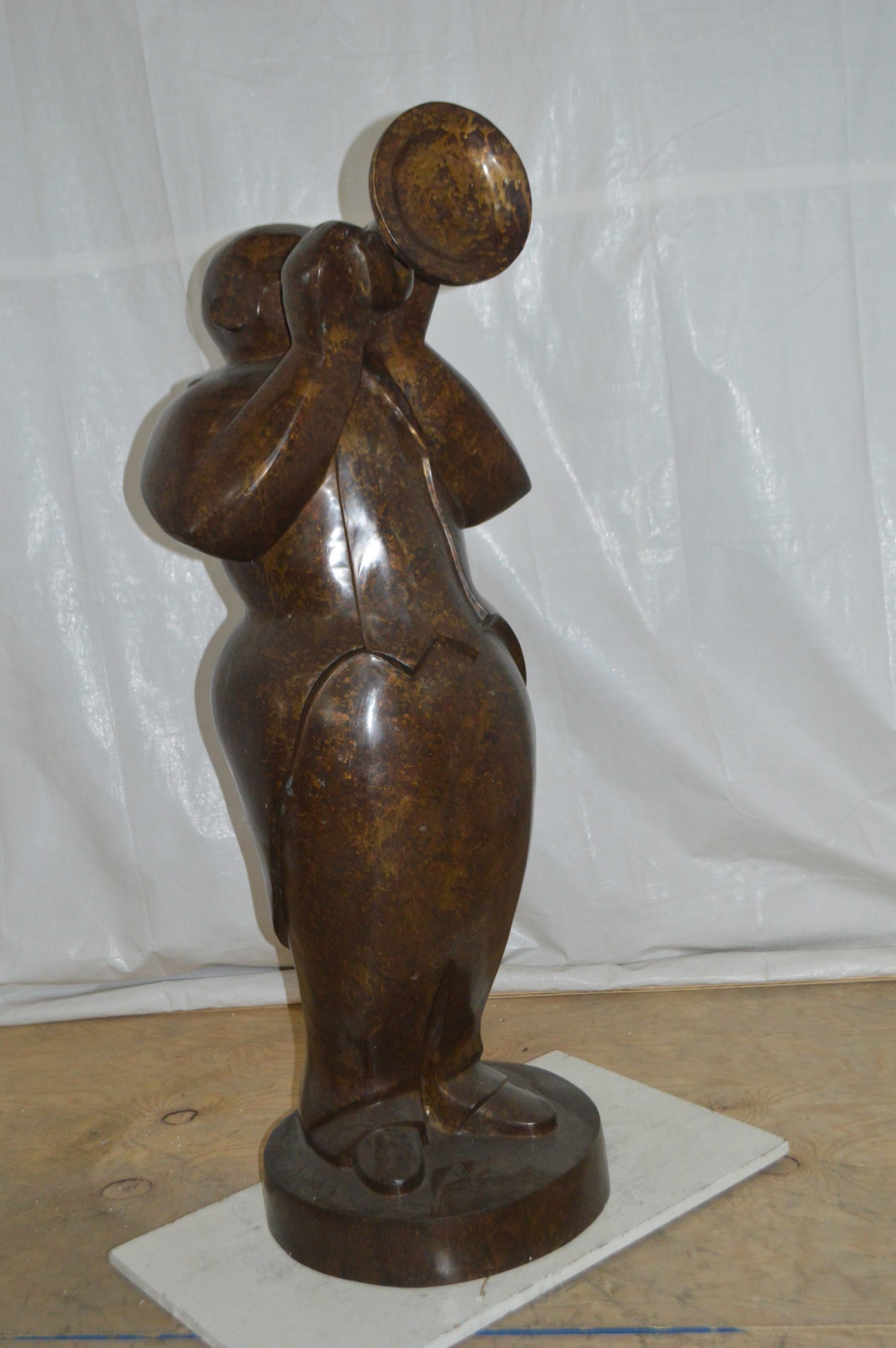 Musician playing the trumpet bronze statue -  Size: 24"L x 20"W x 56"H.