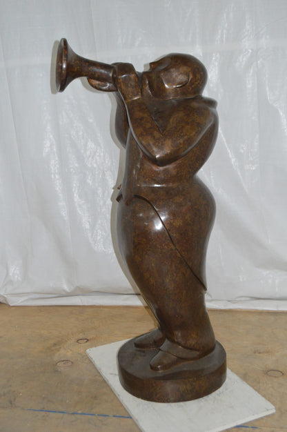 Musician playing the trumpet bronze statue -  Size: 24"L x 20"W x 56"H.