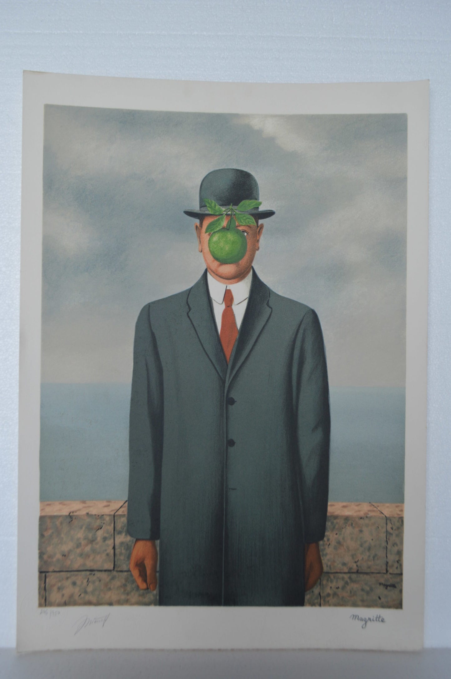 Son of Man by Magritte signed and sealed -  Size: 14"L x 19"W