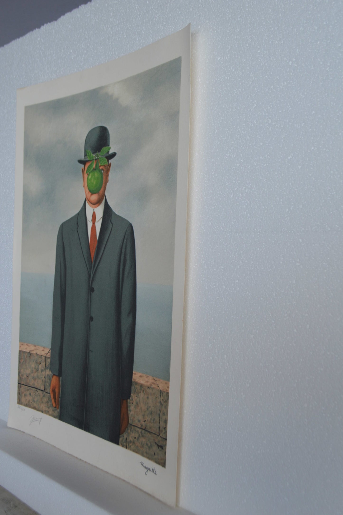 Son of Man by Magritte signed and sealed -  Size: 14"L x 19"W