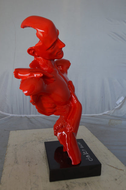 Modern resin statue of a man hugged by a woman -  Size: 17"L x 8"W x 24"H.