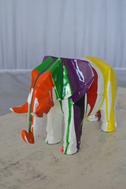 Modern art multicolored elephant resin statue -  Size: 12"L x 6"W x 8"H.