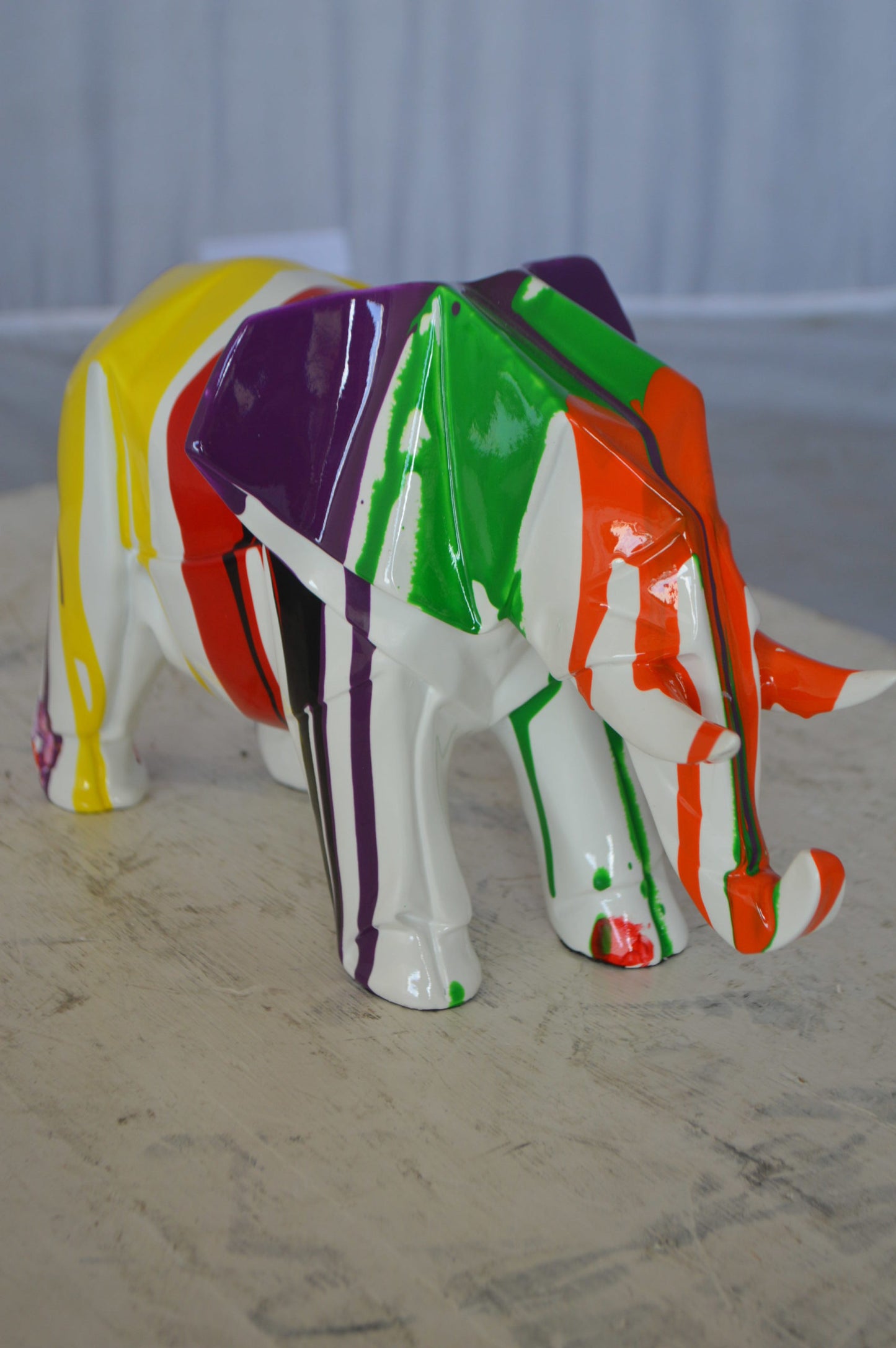 Modern art multicolored elephant resin statue -  Size: 12"L x 6"W x 8"H.