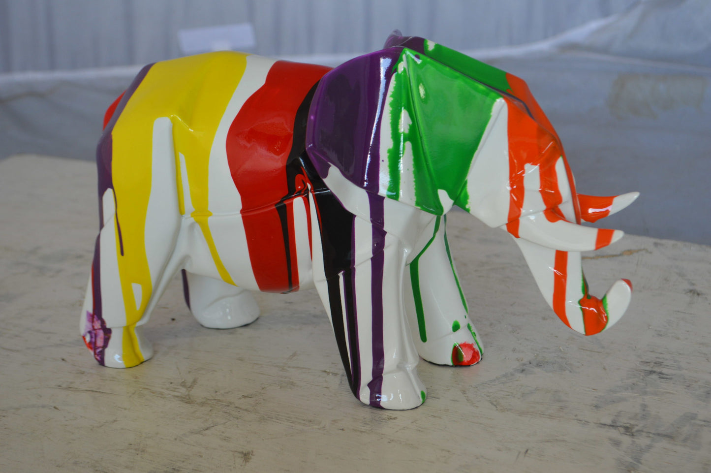 Modern art multicolored elephant resin statue -  Size: 12"L x 6"W x 8"H.