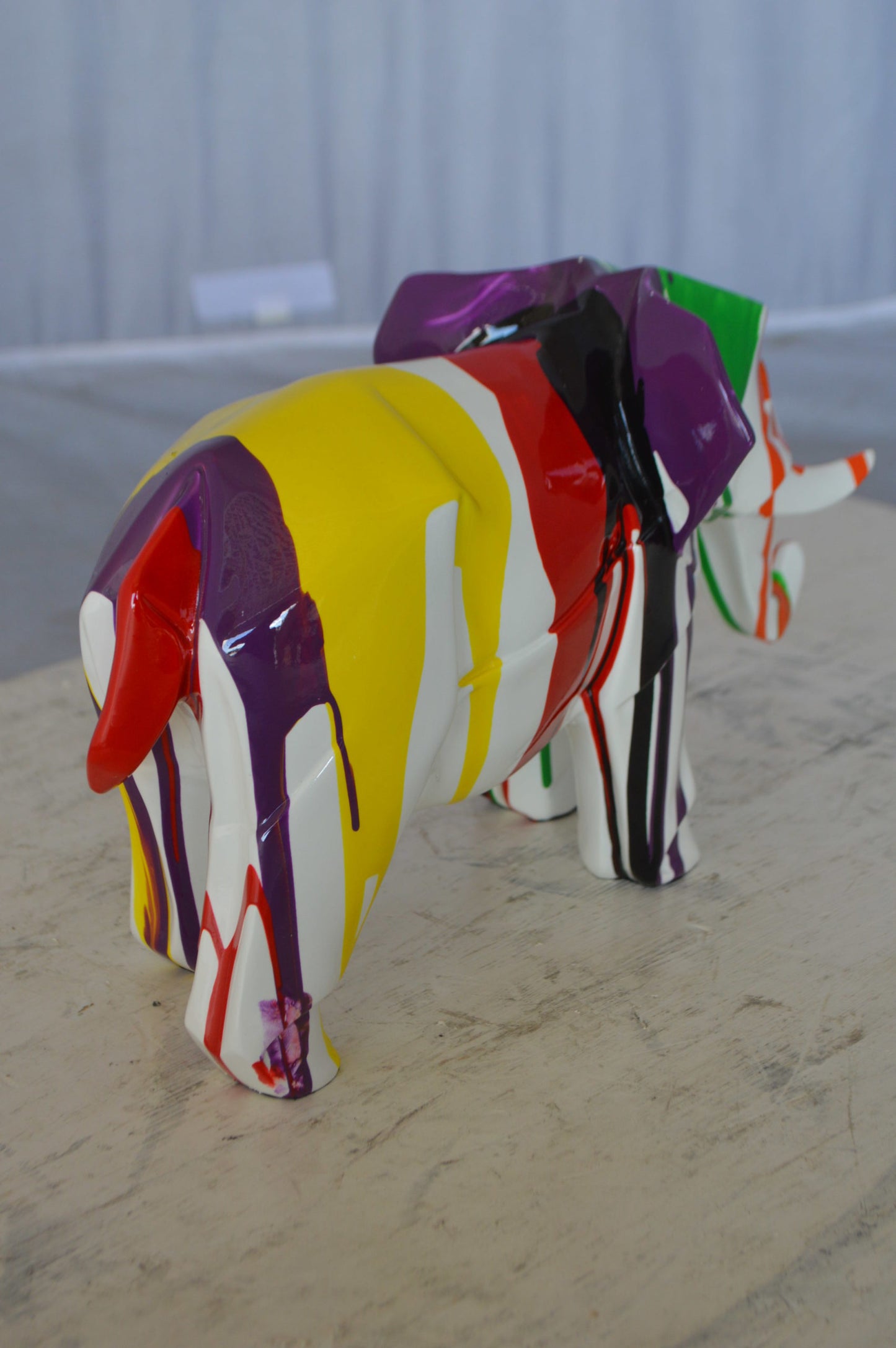 Modern art multicolored elephant resin statue -  Size: 12"L x 6"W x 8"H.