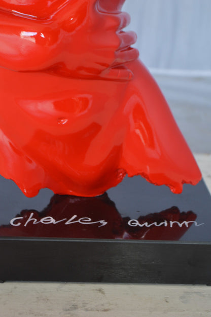 Modern resin statue of a woman hugged by a men -  Size: 13"L x 9"W x 24"H.