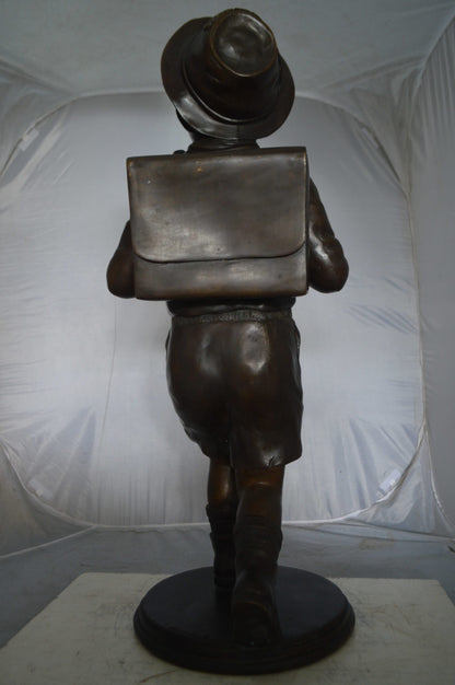 Boy with backpack bronze statue -  Size: 20"L x 18"W x 46"H.