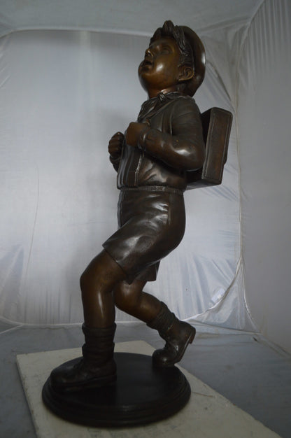 Boy with backpack bronze statue -  Size: 20"L x 18"W x 46"H.