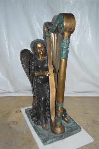 Angel playing a harp bronze statue -  Size: 30"L x 15"W x 44"H.