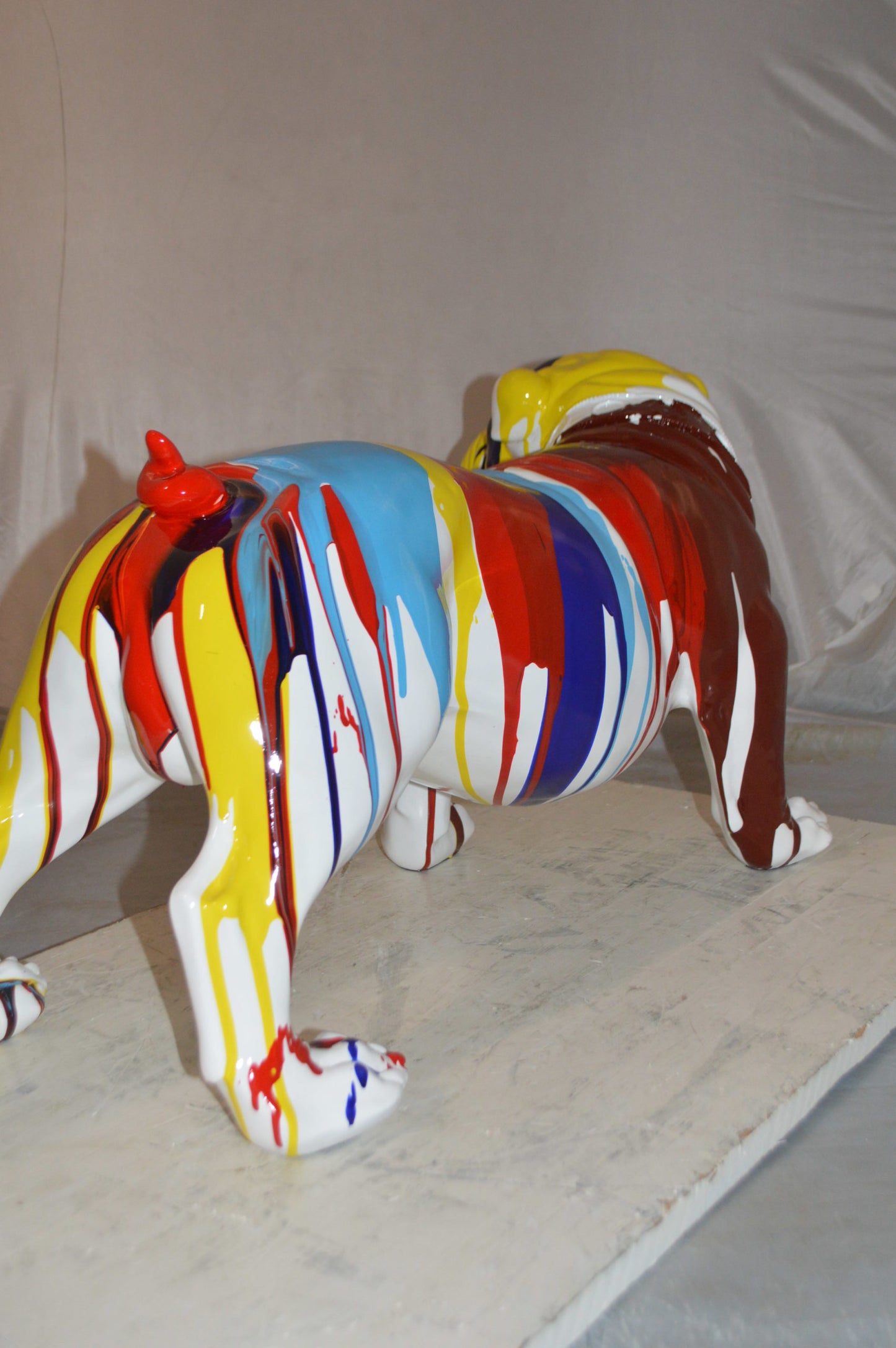 Modern art resin multicolored Bulldog statue -  Size: 28"L x 12"W x 16"H.