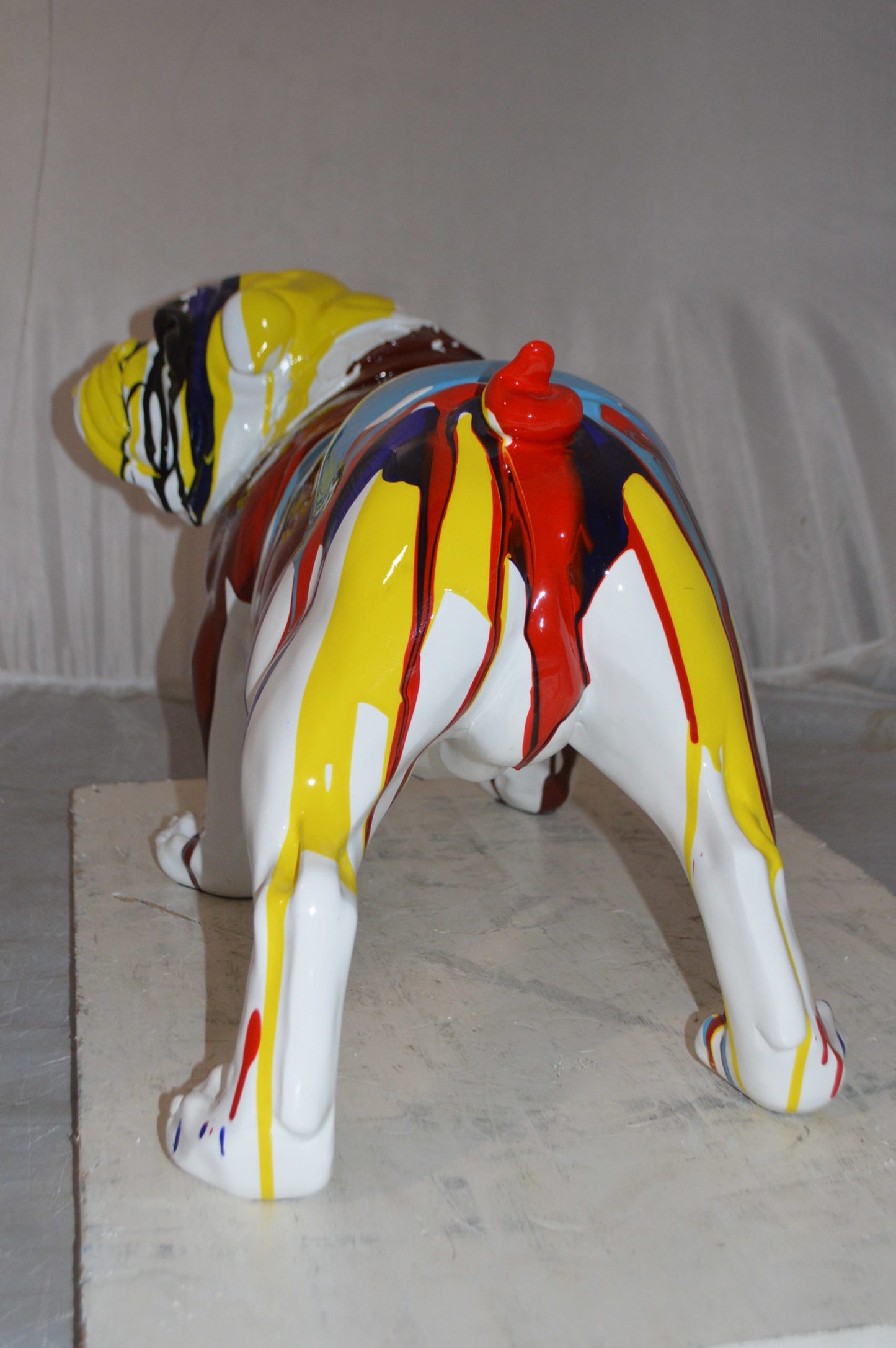 Modern art resin multicolored Bulldog statue -  Size: 28"L x 12"W x 16"H.