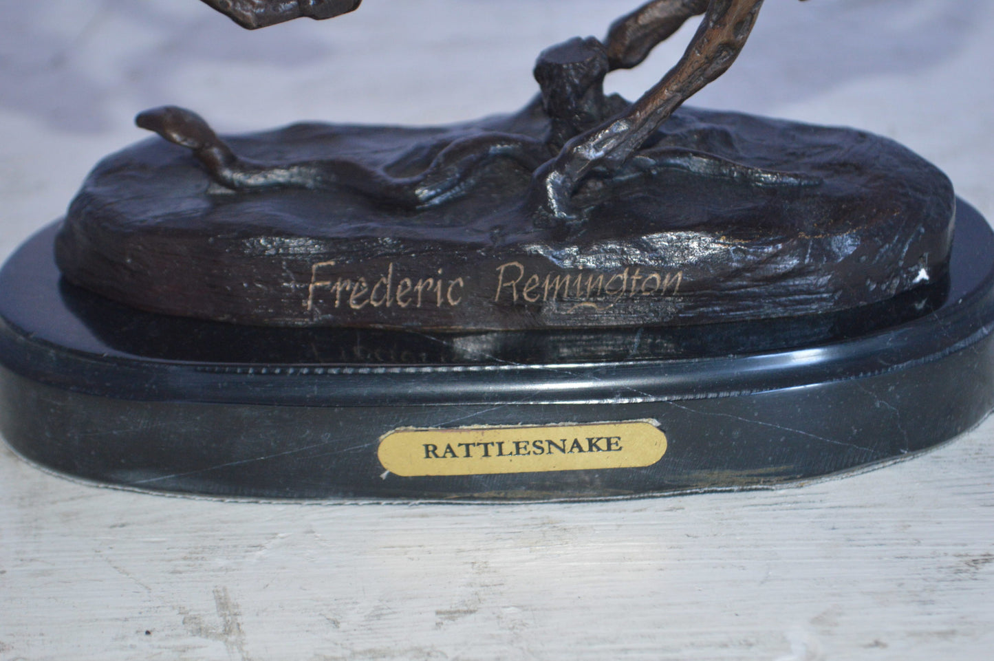 Rattlesnake by Remington Bronze Statue 12H -  Size: 7"L x 3"W x 10"H.
