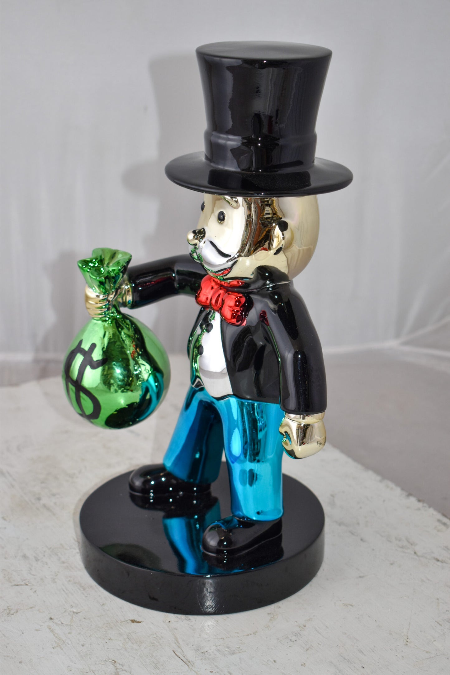 Frowning Monopoly Man Holding Money Bag Resin Statue Small Size: 7" x 8" x 15"H