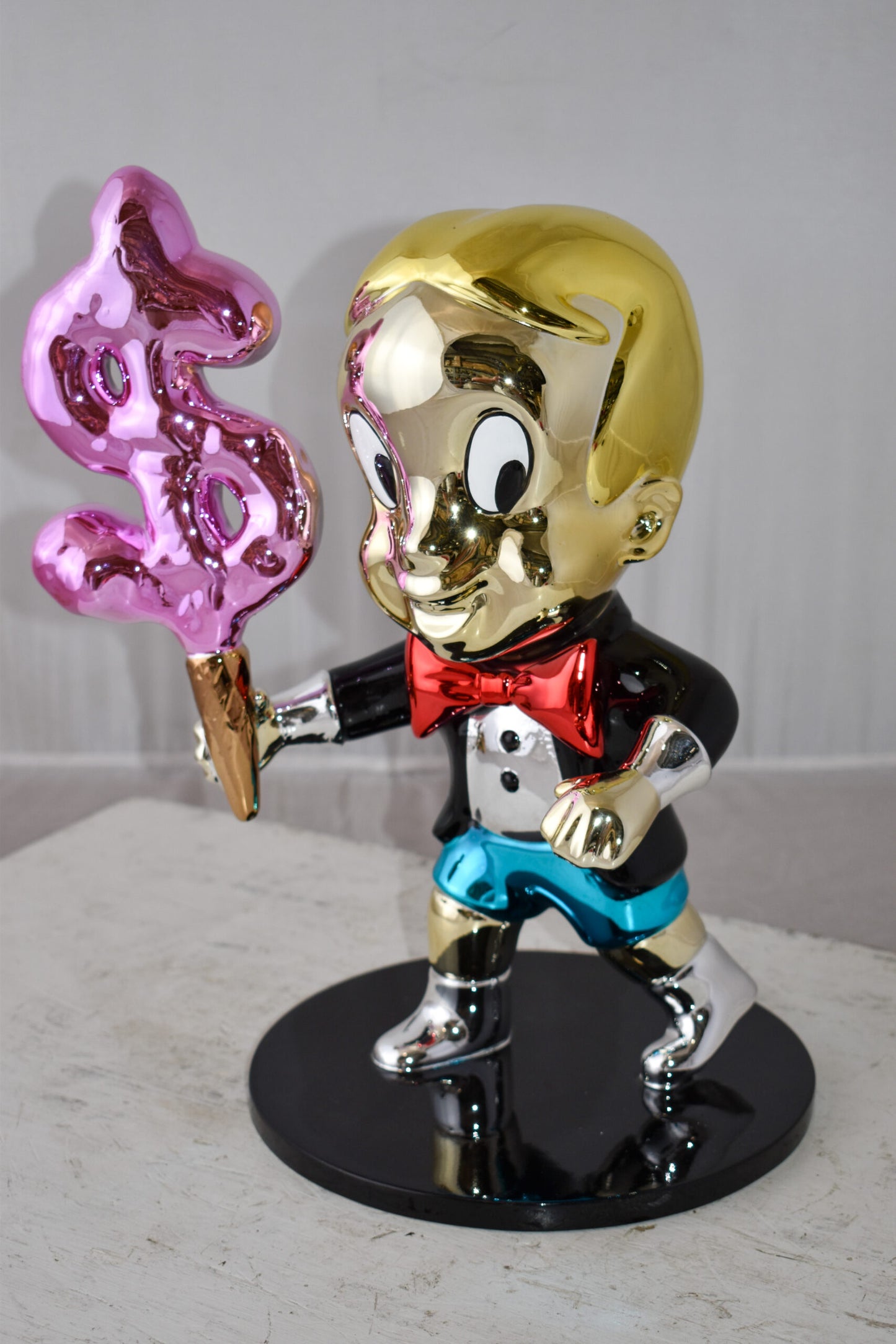 Cartoon Monopoly Girl with Money Cotton Candy Resin Statue 12" x 10" x 15"H