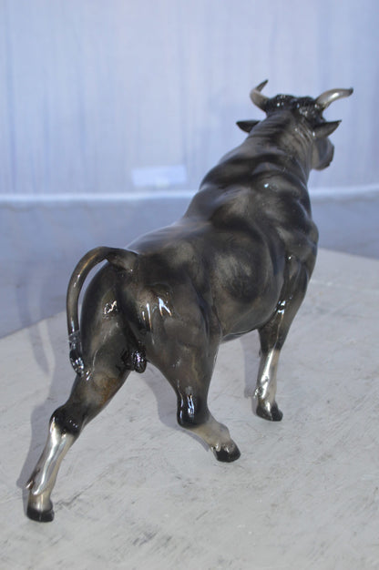Trotting Bull Bronze Statue -  Size: 13"L x 3"W x 10"H.