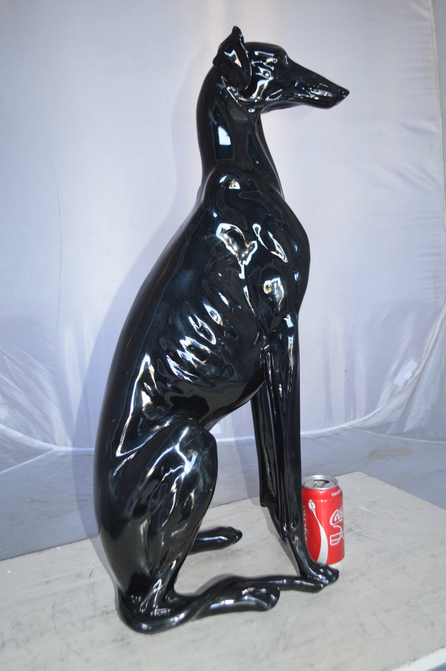 Greyhound Dog statue made of resin -  Size: 12"L x 9"W x 31"H.