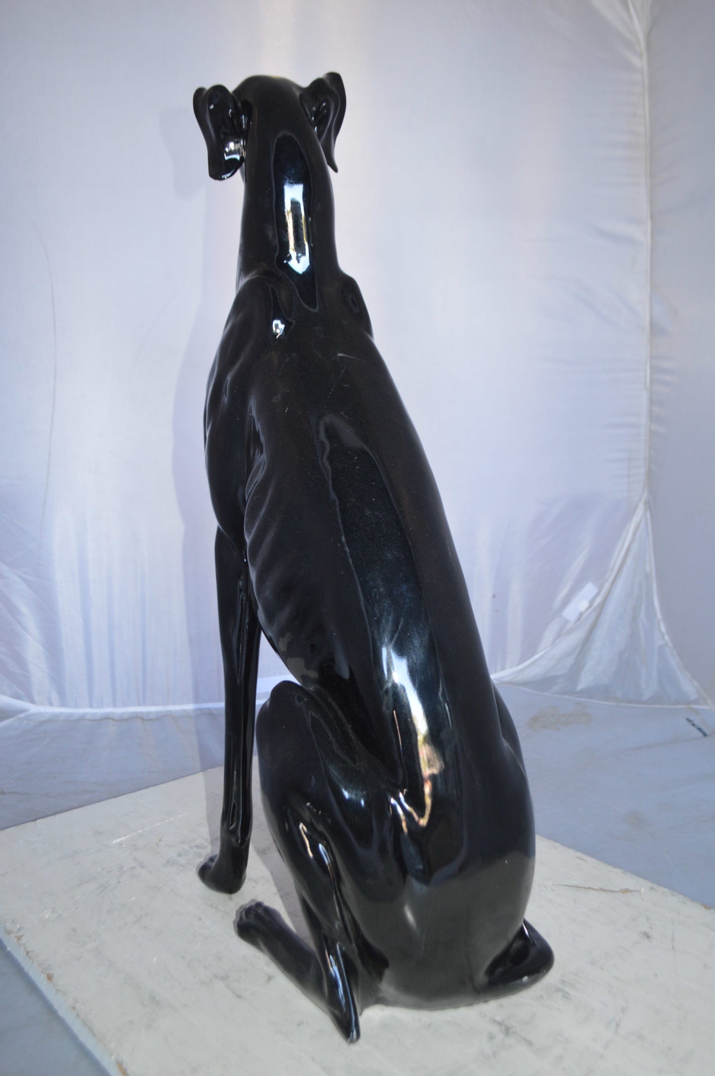 Greyhound Dog statue made of resin -  Size: 12"L x 9"W x 31"H.