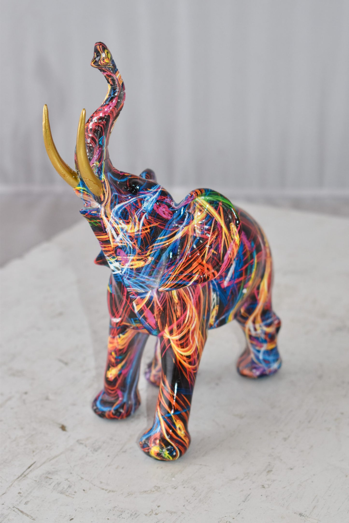 Elephant With His Trunk Up Colored Modern Resin Statue Size: 8" x 4" x 10"H