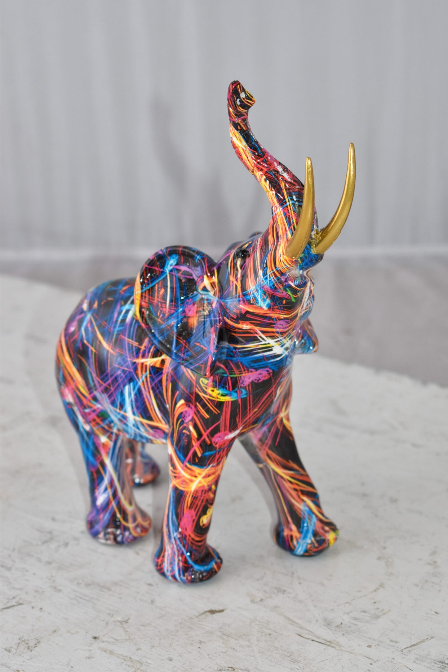 Elephant With His Trunk Up Colored Modern Resin Statue Size: 8" x 4" x 10"H