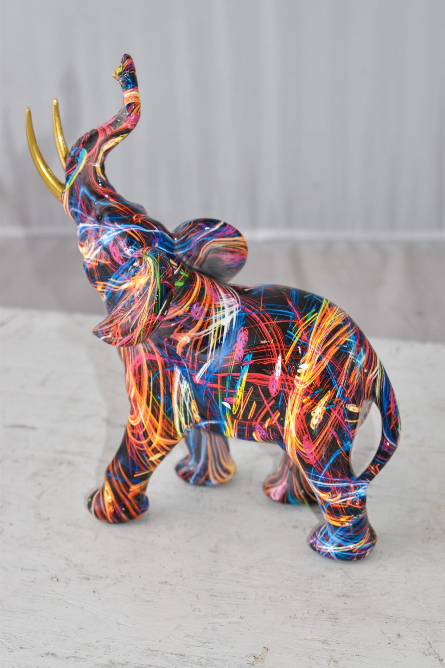 Elephant With His Trunk Up Colored Modern Resin Statue Size: 8" x 4" x 10"H