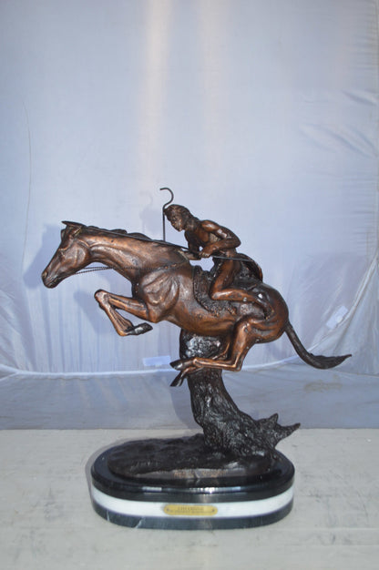 Cheyenne by Remington Bronze Statue replica  -  Size: 12"L x 7"W x 19"H.