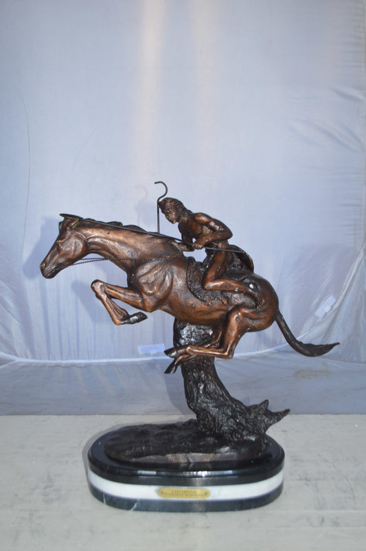 Cheyenne by Remington Bronze Statue replica  -  Size: 12"L x 7"W x 19"H.