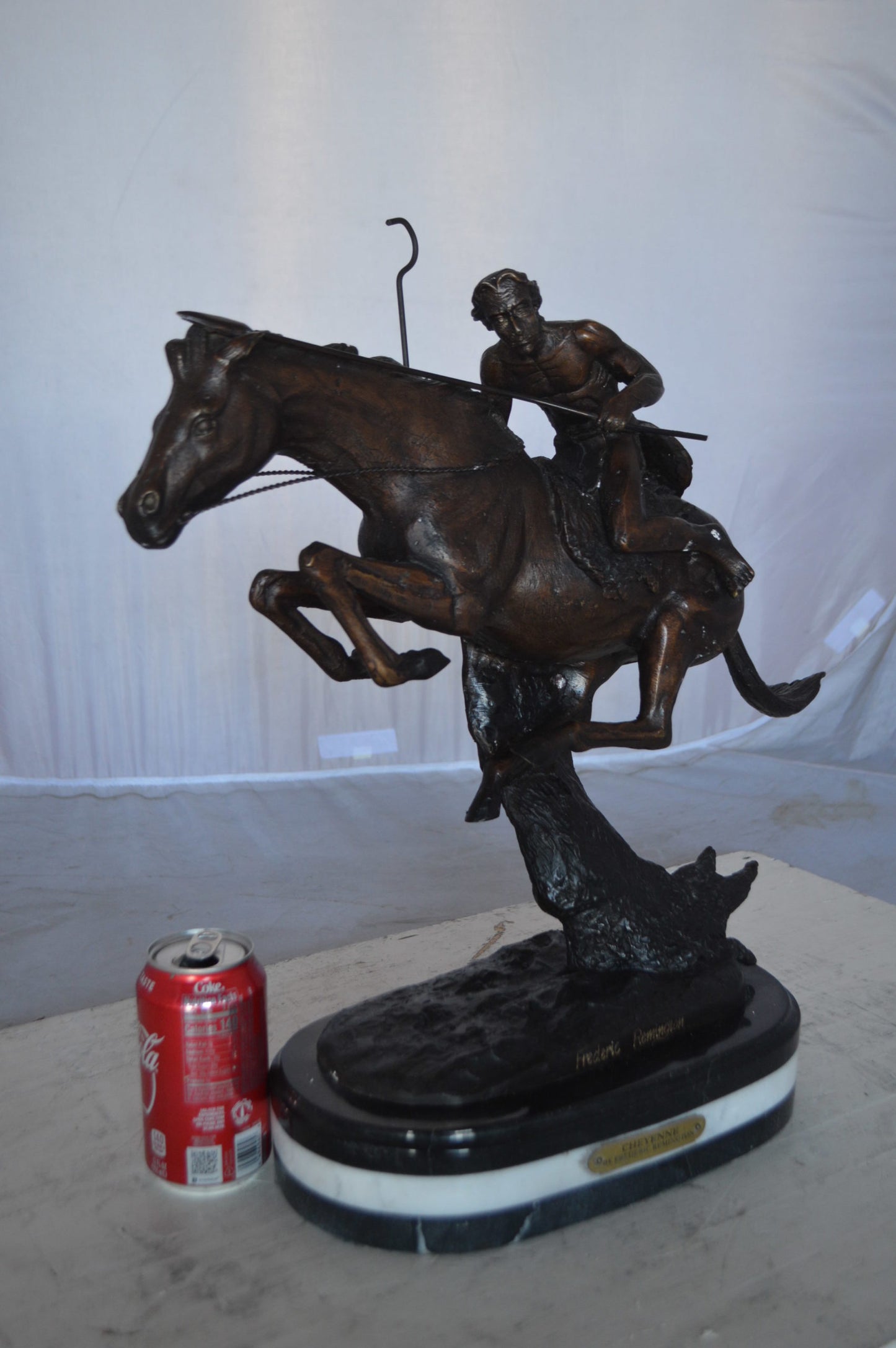 Cheyenne by Remington Bronze Statue replica  -  Size: 12"L x 7"W x 19"H.