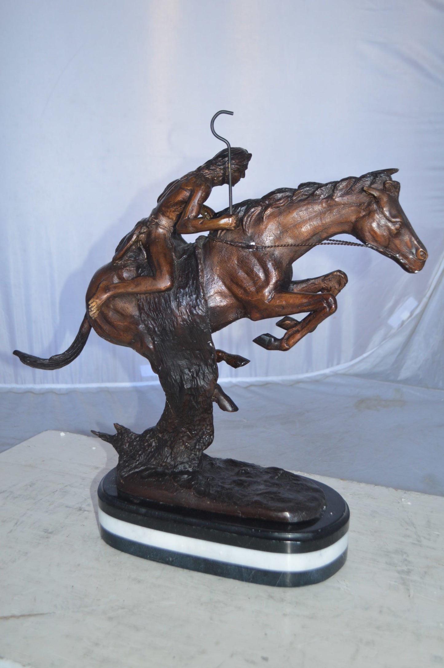 Cheyenne by Remington Bronze Statue replica  -  Size: 12"L x 7"W x 19"H.