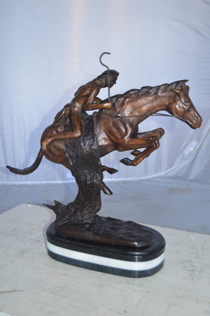 Cheyenne by Remington Bronze Statue replica  -  Size: 12"L x 7"W x 19"H.