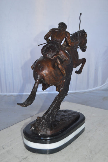 Cheyenne by Remington Bronze Statue replica  -  Size: 12"L x 7"W x 19"H.