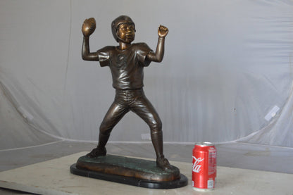 Young Quarterback bronze statue - Size: 14"L x 6"W x 20"H.