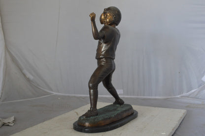 Young Quarterback bronze statue - Size: 14"L x 6"W x 20"H.