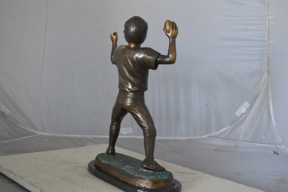 Young Quarterback bronze statue - Size: 14"L x 6"W x 20"H.
