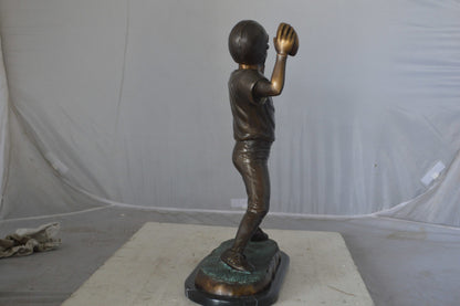 Young Quarterback bronze statue - Size: 14"L x 6"W x 20"H.