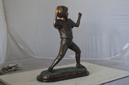 Young Quarterback bronze statue - Size: 14"L x 6"W x 20"H.