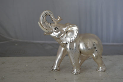 Elephant statue made of resin - Size: 9"L x 4"W x 8"H.