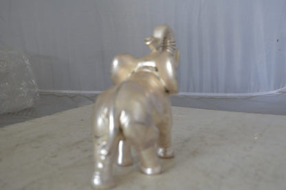 Elephant statue made of resin - Size: 9"L x 4"W x 8"H.