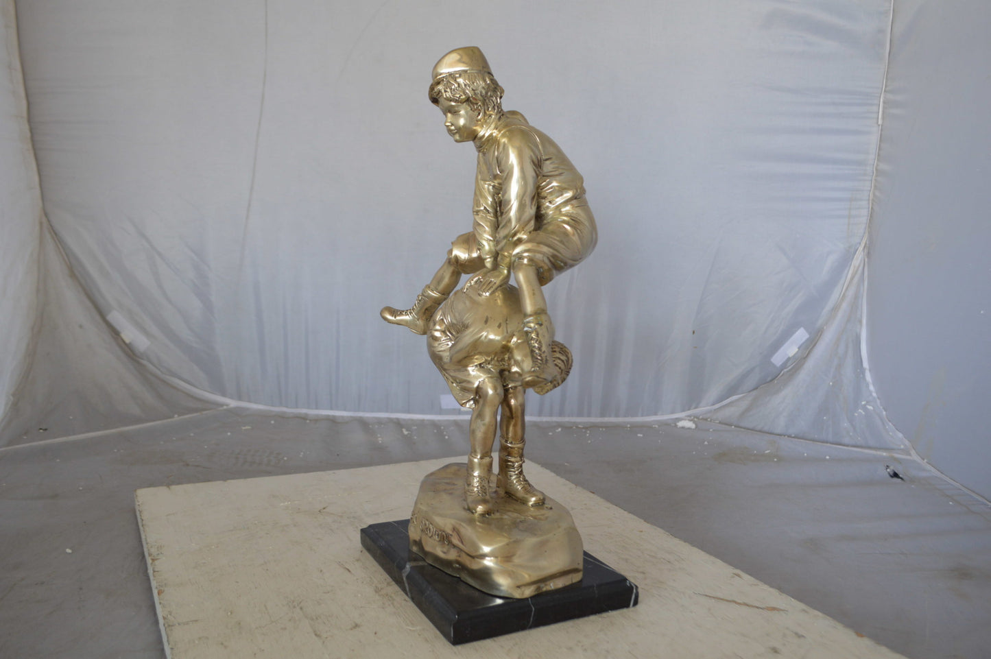 Leapfrog bronze statue silver finish  - Size: 12"L x 7"W x 19"H.