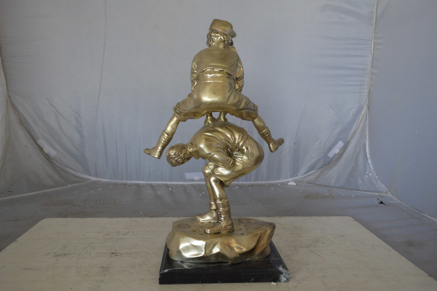 Leapfrog bronze statue silver finish  - Size: 12"L x 7"W x 19"H.