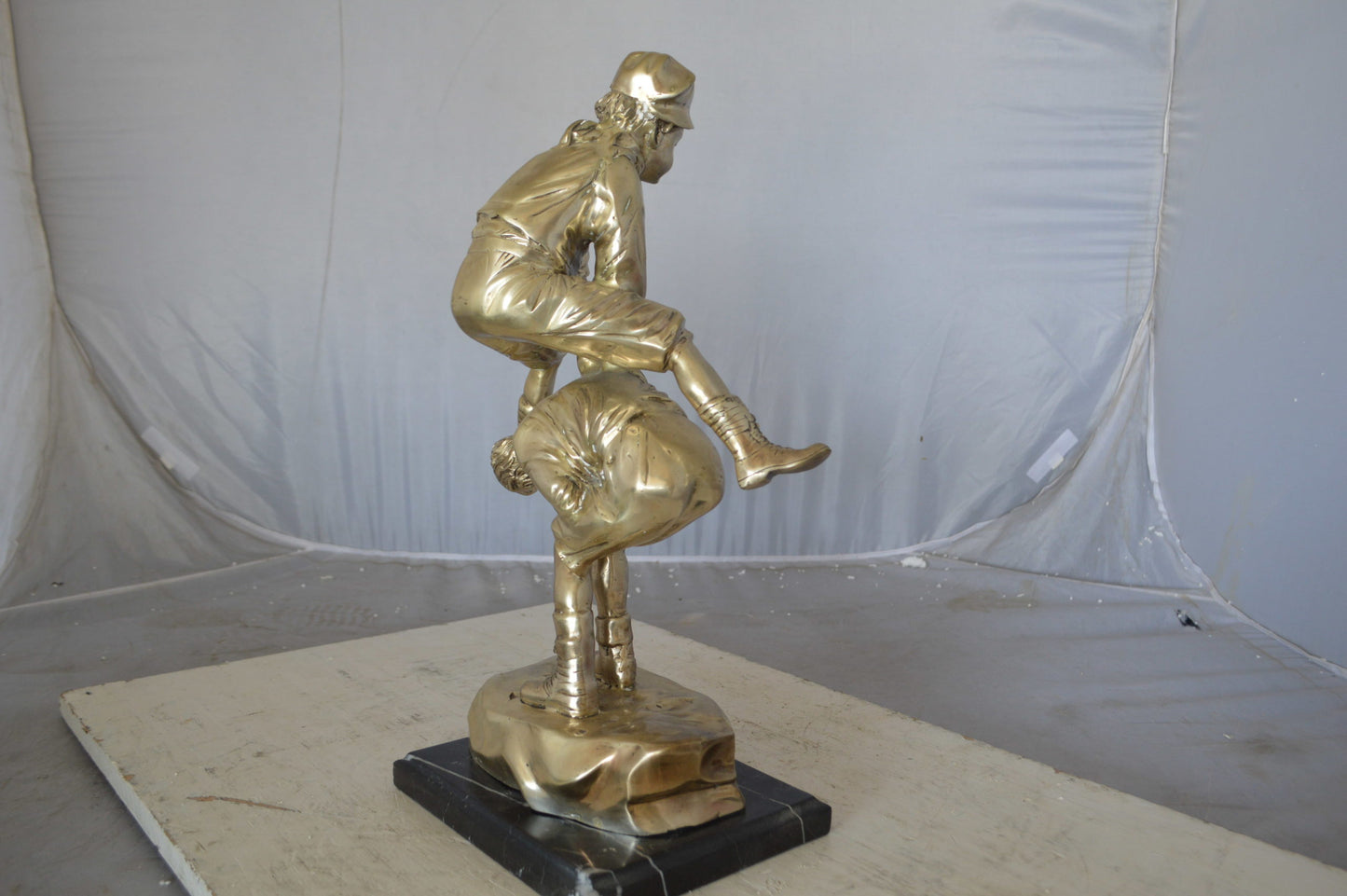 Leapfrog bronze statue silver finish  - Size: 12"L x 7"W x 19"H.