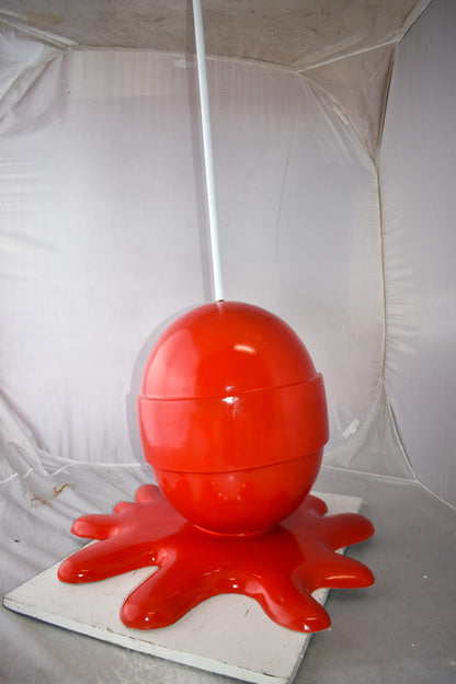 Giant Red Lollipop Melted on The Ground Resin Statue Size: 31" x 27" x 56"H