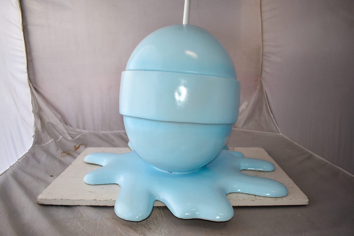 Giant Blue Lollipop Melted on The Ground Resin Statue Size: 31" x 27" x 56"H