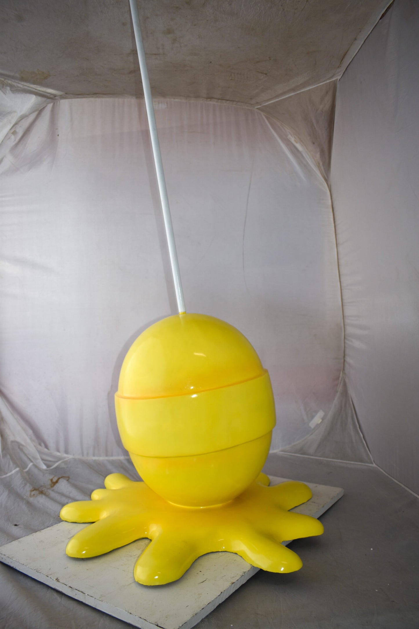 Giant Yellow Lollipop Melted on The Ground Resin Statue Size: 31" x 27" x 56"H