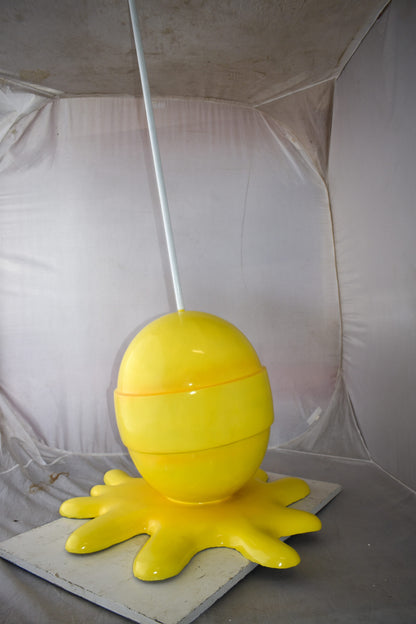 Giant Yellow Lollipop Melted on The Ground Resin Statue Size: 31" x 27" x 56"H